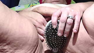 Fucking a Brush in Her Hairy Bush