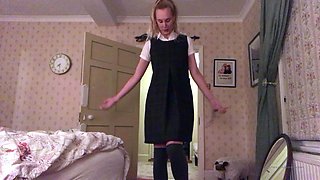 Cute tattooed milf makes solo striptease porn