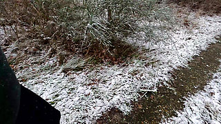 Slapping her tits while hiking through the snow