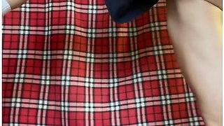 Schoolgirl flashes white panties under her skirt