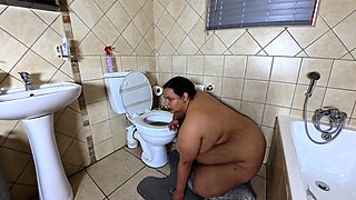Playing with my fat pussy while licking the toilet