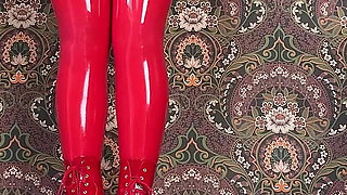 Red Ballet Boots on Wooden Floor