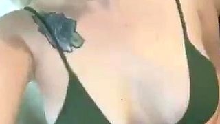 Busty babe oiled babe with big boobs masturbating on cam