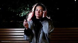 Sexy Russian Beauty Smoking Cigarette by Seaside