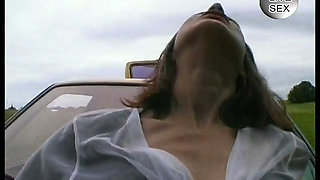 Mature horny bitch masturbates on car hood