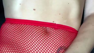 Redhead masturbates in a lacy panties and sheer stockings