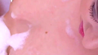 Hot blonde Daniella Margot fucks herself with a finger in the bath