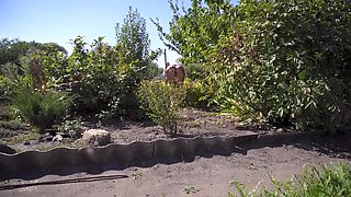 Hot Neighbor MILF Flashing Thong Upskirt in Garden Voyeur Spy